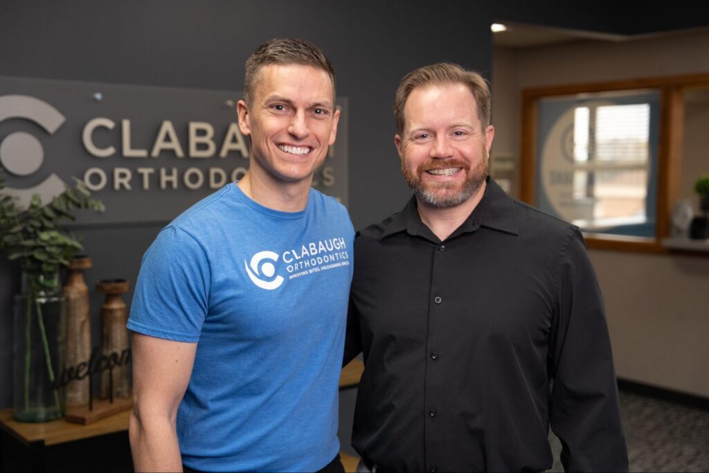 Dr. Clabaugh and a patient with clear braces.
